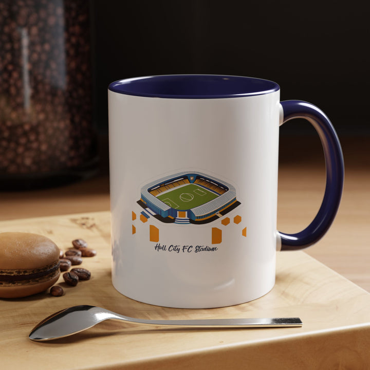 A navy blue Hull City stadium mug with a timeless finish and a detailed panoramic MKM Stadium illustration. The deep tone provides a classic look, ideal for a desk or study setting where a supporter can quietly enjoy warm drinks while keeping their football loyalty close, subtle yet unmistakably passionate.