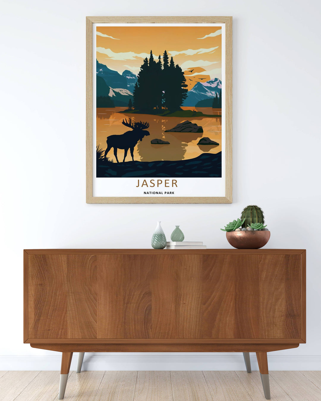 Colorful graphic silhouette illustration print of the famous Spirit Island lookout during golden hour in Jasper National Park, crafted as a canvas print, an unframed poster, or a gold framed gallery wall statement piece.