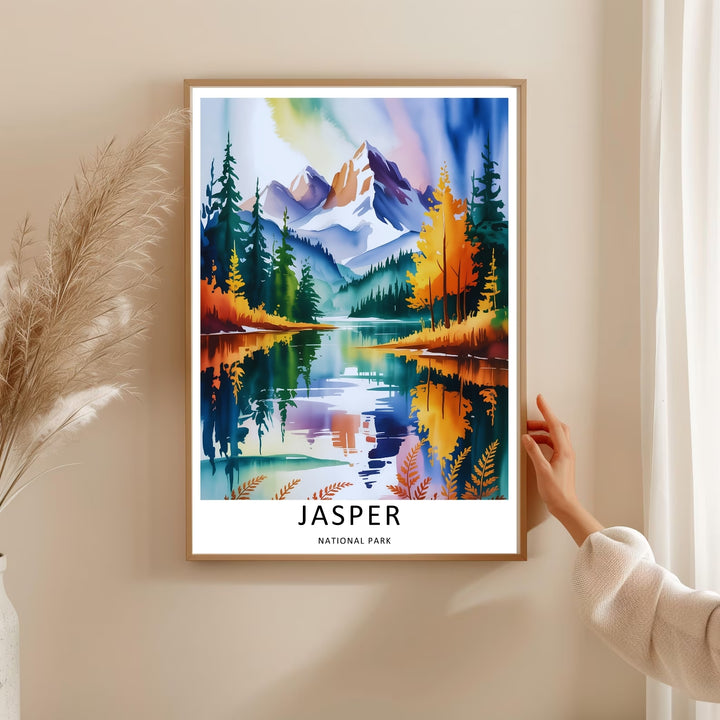 A bold vector graphic work capturing colorful orange and gold autumn trees overlooking a glacial lake in Jasper National Park, ready to order as an unframed print, canvas, or a natural wood framed wall art piece.