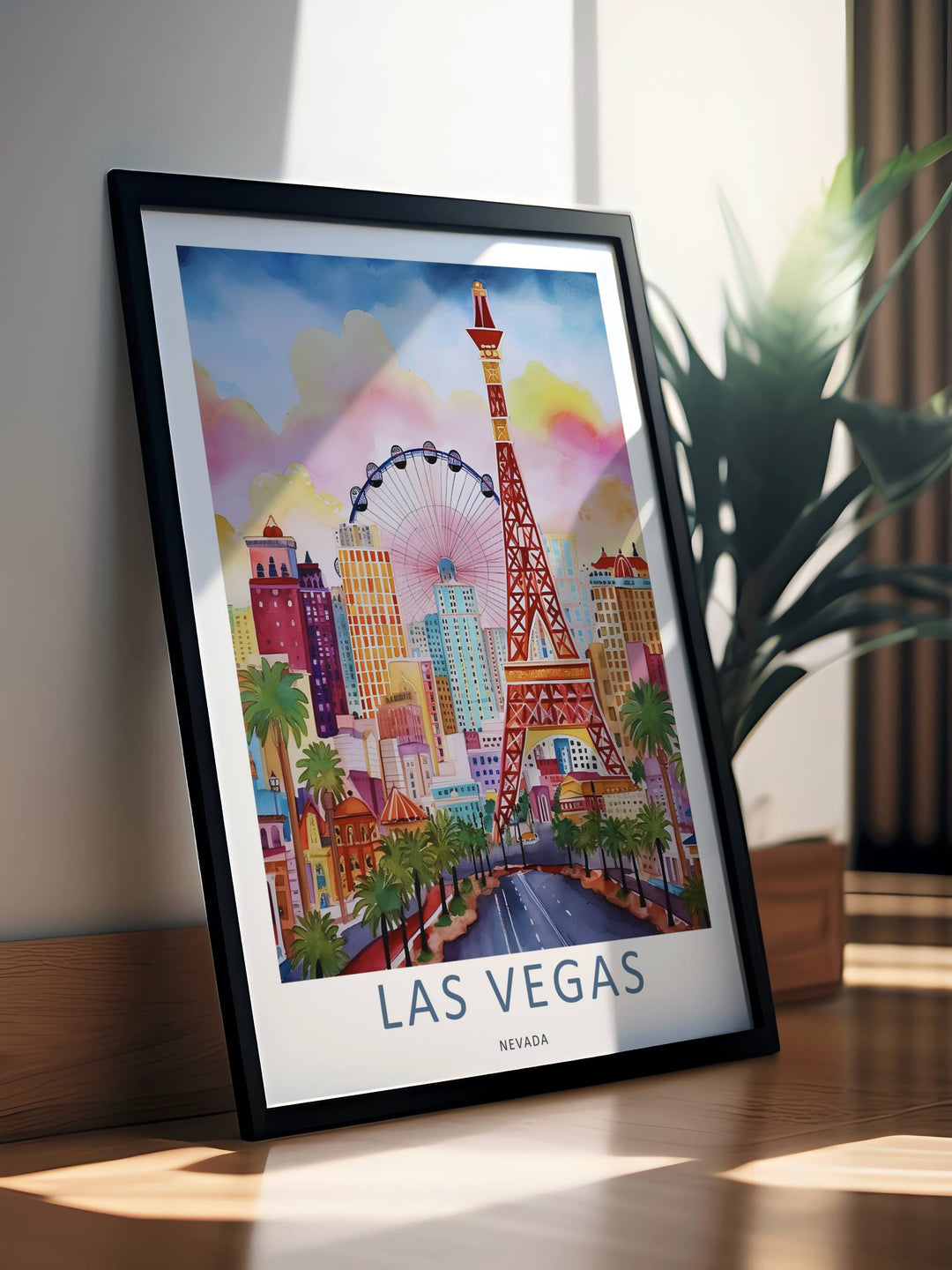A luxury framed poster display of a watercolor Las Vegas strip view. The artwork features soft hand-painted architectural textures, a large wheel, and a clean white margin that matches light paint.