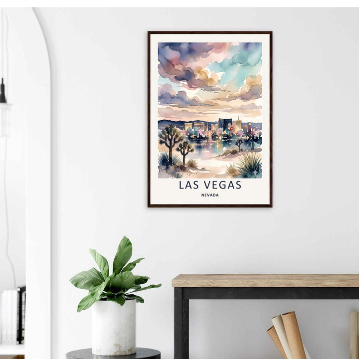 Premium wall decor mockup showcasing an unframed or framed Las Vegas watercolor art poster. The design highlights a stunning desert sunset palette with rich shades of peach, lavender, and deep blue washes.
