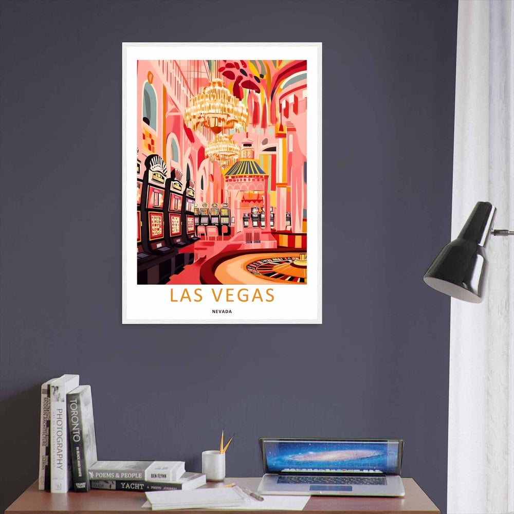 Retro Las Vegas casino and slot machine print displayed in a modern black frame. The artwork features rich tones of flamingo pink, coral, amber, and gold reflecting across a luxury roulette table wheel.