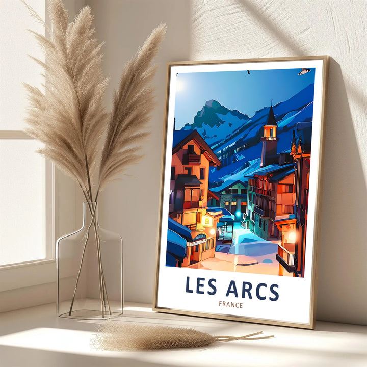 Minimalist typography reading LES ARCS FRANCE anchors this print displaying illuminated village architecture and mountain peaks. Choose your format: unframed paper print, gallery canvas, or framed display.