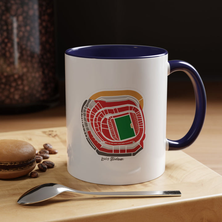 A navy blue Levi’s Stadium mug with a refined matte tone and precise stadium artwork. Photographed in a cozy work desk setting, perfect for supporters who enjoy subtle yet meaningful fan representation. The deep color gives it a classy aesthetic while keeping the stadium illustration the focal point.