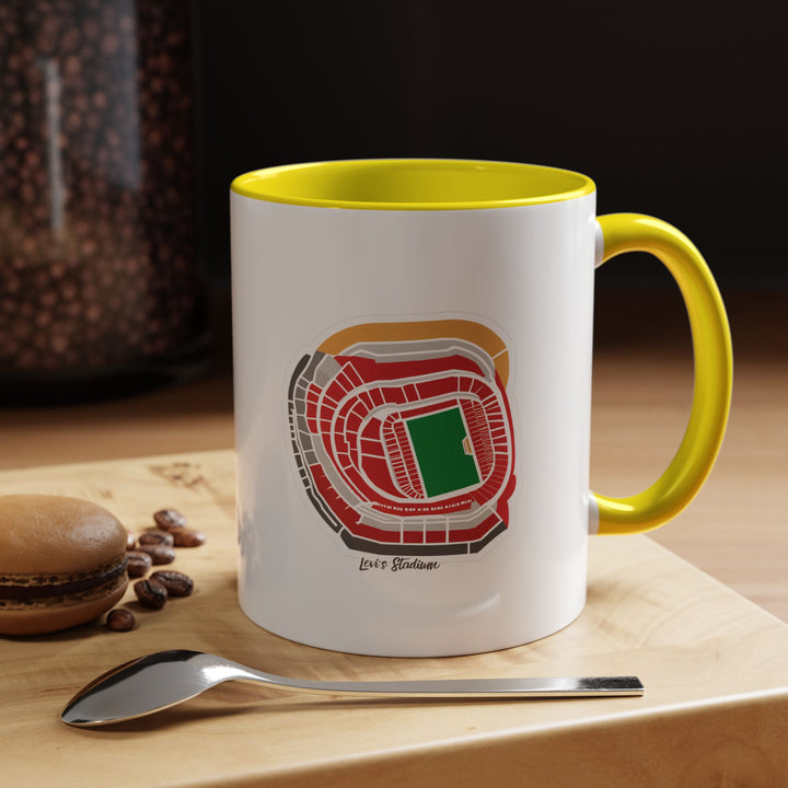 A bright yellow Levi’s Stadium mug featuring artistic stadium detail in a cheerful, energetic tone. Shown in a sunny coffee moment, symbolizing optimism and match-day excitement. Ideal for fans who enjoy adding color and warmth to their supporter collection while celebrating The 49ers and their home stadium.