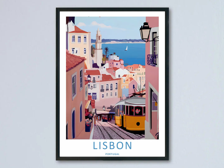 A beautiful framed Lisbon travel poster from MapYourDreams, showcasing a yellow tram on a steep pink street overlooking a deep blue ocean with a lone sailboat.