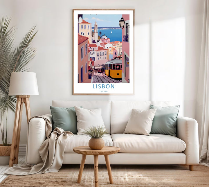 Contemporary room arrangement featuring an unframed Lisbon skyline poster by MapYourDreams, capturing a serene coastal atmosphere with soft pastel pink walls.