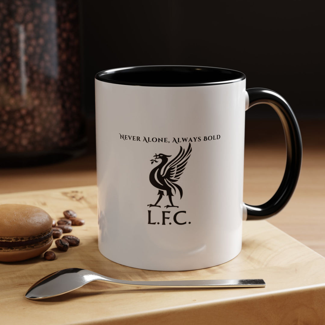 A sleek black Liverpool FC coffee mug printed with the iconic club crest symbol in bold detail, offering a modern and stylish way for supporters to express team pride. The striking contrast between the black ceramic and the vibrant crest gives this mug a premium look, ideal for office desks, home kitchens, supporter gatherings, and match day rituals. Durable, comfortable, and perfect as a gift for passionate Liverpool fans of all ages.
