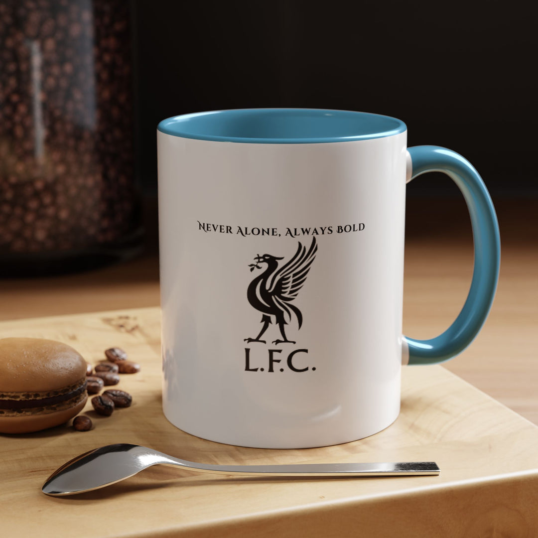 This blue Liverpool FC coffee mug features the official club crest prominently printed on the front, making it a perfect everyday companion for passionate Reds supporters. The blue color adds a bold yet classic touch, while the ceramic material ensures durability and comfort. Ideal for morning coffee, evening tea, or displaying your team pride at home, the office, or match-day gatherings.