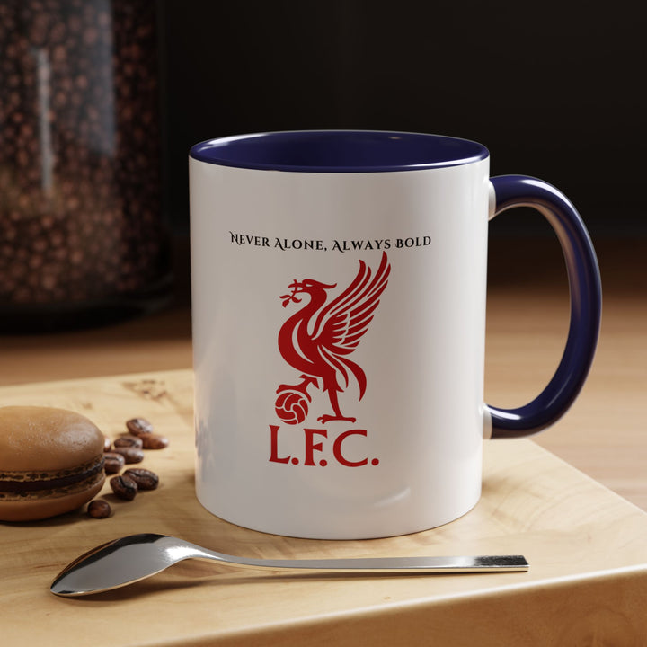 A navy blue Liverpool FC mug with the crest displayed clearly against the deep, classic tone. Photographed in an elegant desk or study environment, making it an ideal choice for supporters who prefer subtle, timeless expressions of loyalty while enjoying warm beverages throughout daily routines.