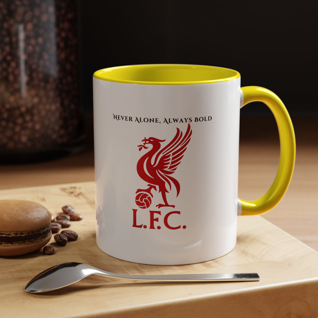 A bright yellow Liverpool FC mug featuring the club crest, styled in a sunny, cheerful setting that reflects optimism and enthusiasm. Perfect for fans who want their morning coffee or match-day tea to feel energized and uplifting, keeping the spirit of Liverpool close in every sip.