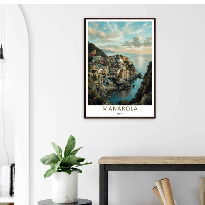 A stylized landscape print displaying a vintage fine art style Manarola Cinque Terre Italy sea cliff line looking down over the harbor, with options to purchase as an unframed print, canvas, or a luxury silver frame.