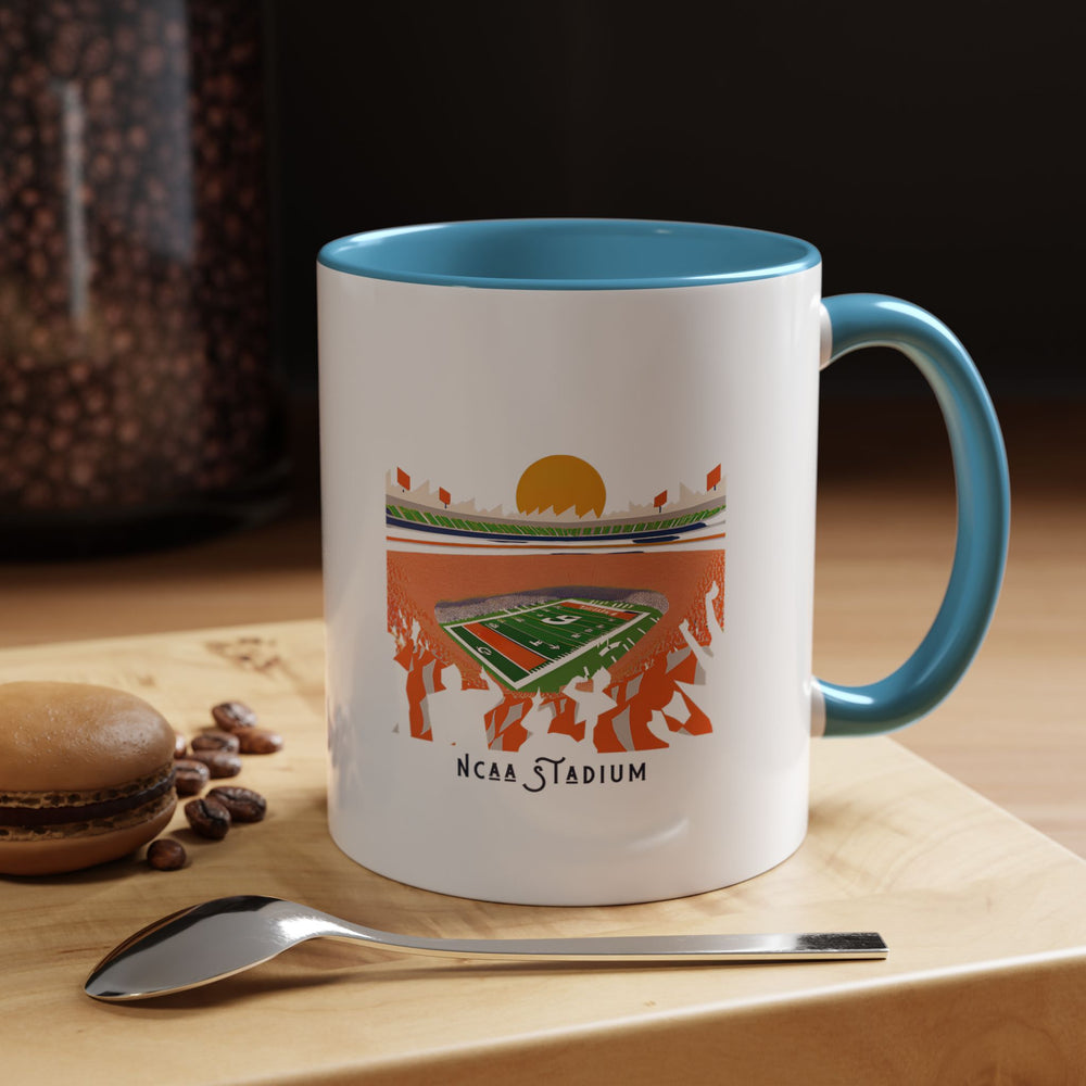 A blue NCAA Stadium mug showcasing a detailed stadium illustration in vivid print. The bright blue tone contrasts beautifully with the stadium artwork, highlighting collegiate football pride. Perfect for coffee, tea, or hot beverages at home, in the office, or at tailgates, making it a functional and stylish fan accessory.