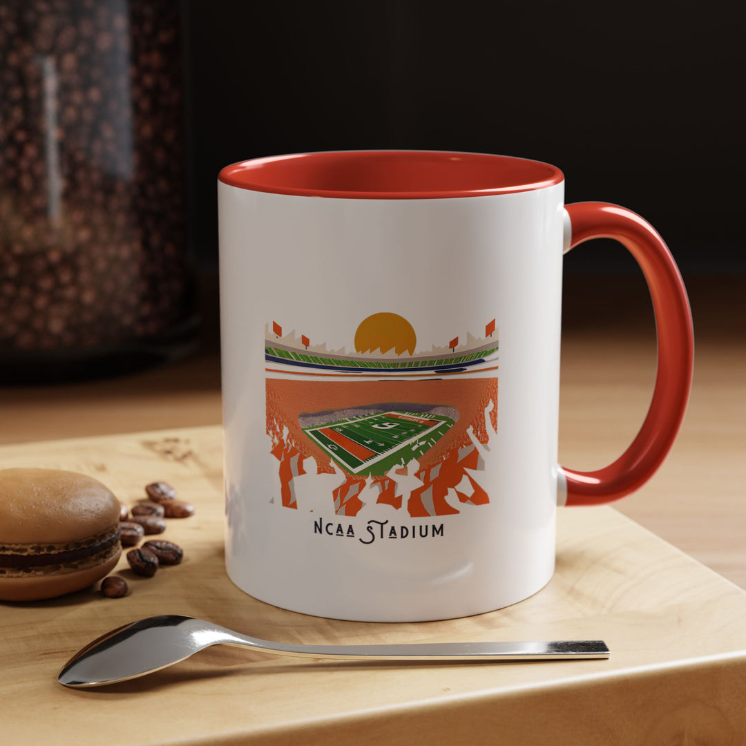 A red NCAA Stadium mug featuring a detailed artistic illustration of a college football stadium. The vibrant red color makes the mug stand out while celebrating college football pride. Perfect for morning coffee, afternoon tea, or hot chocolate, it’s ideal for home, office, tailgates, or as a collector’s item for college football fans.