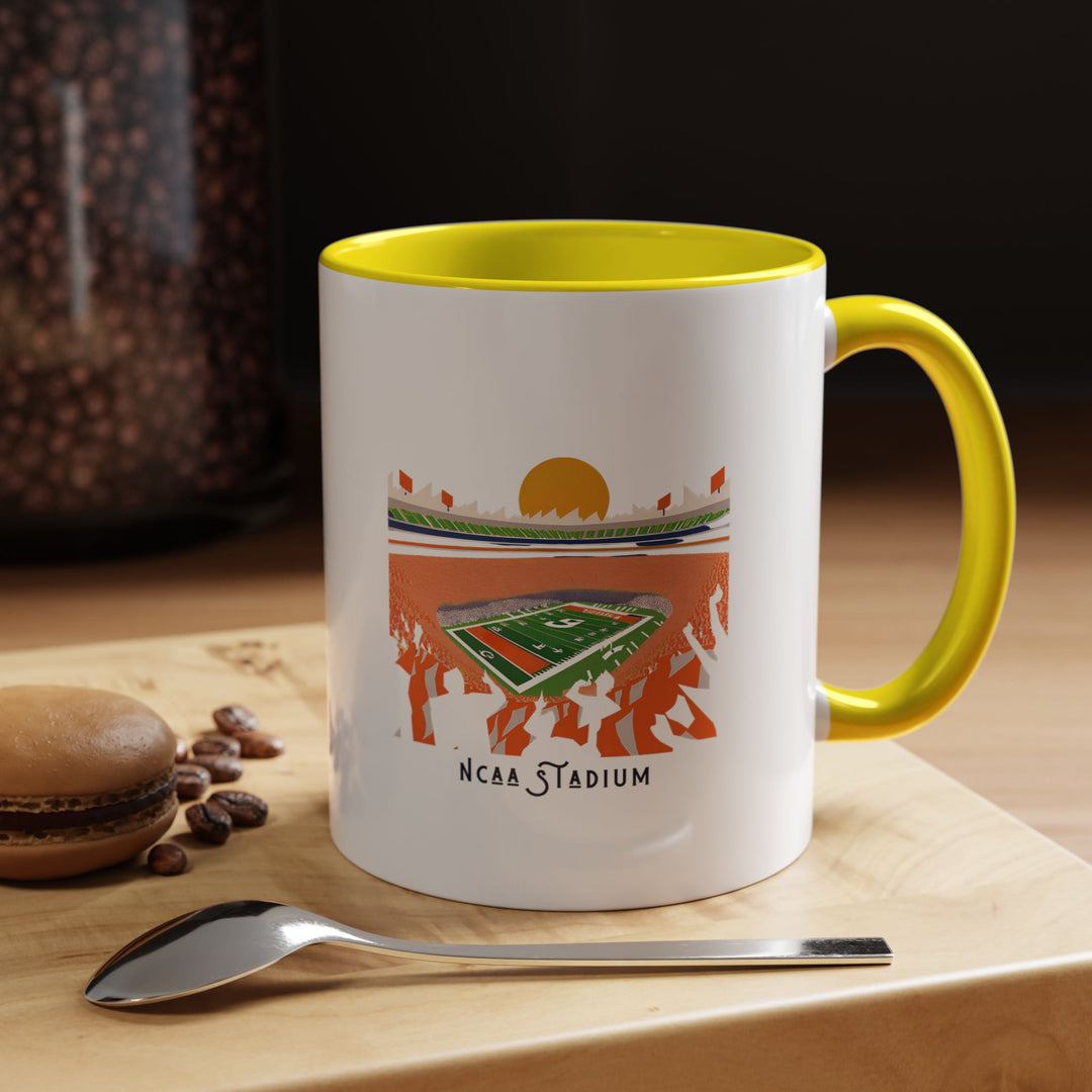 A yellow NCAA Stadium mug featuring a college football stadium design in vivid detail. The bright yellow color creates a cheerful and energetic look, celebrating college football enthusiasm. Great for coffee, tea, or hot drinks at home, office, or during game-day gatherings, and makes a thoughtful fan gift.