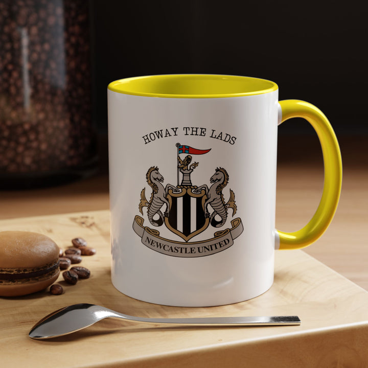 A yellow Newcastle United coffee mug with the official club crest displayed clearly. The bright yellow color adds energy and optimism while emphasizing team pride. Ideal for daily coffee, tea, or hot chocolate, at home, in the office, or during game-day celebrations, this mug is a vibrant choice for supporters.