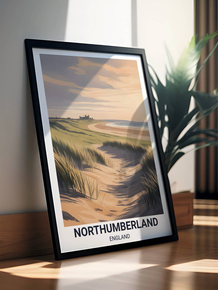 A vertical wall art poster of Bamburgh Castle at sunset, featuring a dramatic etched illustration style with deep charcoal shadows and golden dunes.