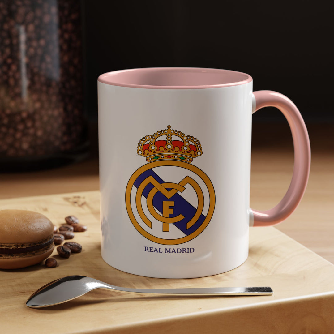 Featuring the official Real Madrid crest, this pink ceramic mug combines functionality with supporter pride. Perfect for enjoying warm drinks at home or at the office, it also serves as a playful and modern gift for football fans who want to show their love for Los Blancos.