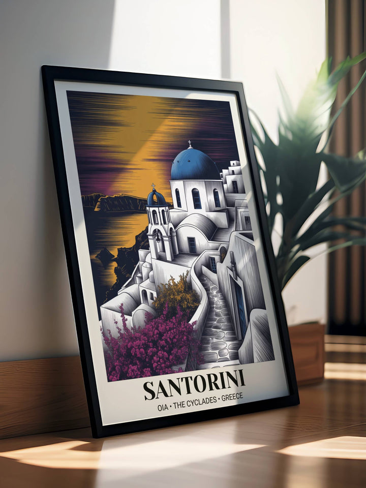 Modern-etched Santorini art print of Oia at sunset featuring a blue dome church and vibrant magenta bougainvillea, shown in a sleek black frame on a neutral-toned gallery wall.