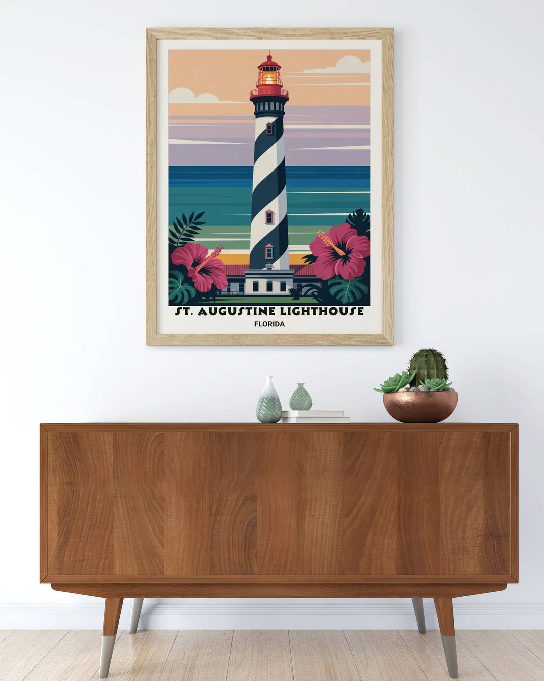 Modern coastal wall art designed for a minimalist living room, featuring the iconic Florida spiral tower framed by tropical hibiscus and dark greenery.
