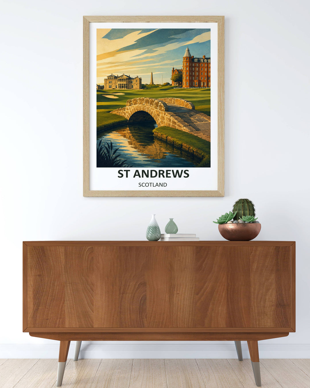 Sophisticated man cave wall decor showcasing a modern graphic print of St Andrews Links Scotland, featuring the iconic 18th hole scenery with the Swilcan Bridge, rolling fairways, and grand historic architecture.