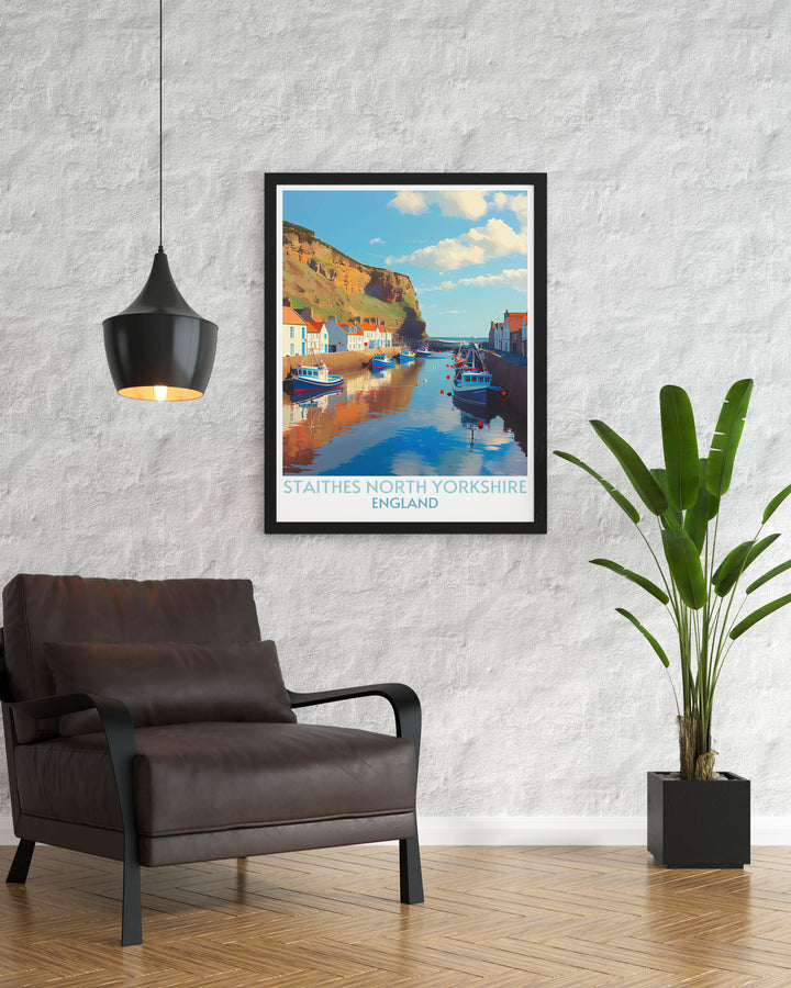 Scenic poster of Staithes Harbour, highlighting the colorful fishing boats and tranquil waters against the backdrop of rugged cliffs. A beautiful addition to any coastal themed decor.