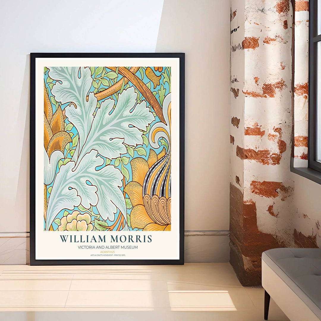 Decorative wall art print of William Morris Acanthus blue and yellow leaf poster set against a clean cream margin, bringing timeless vintage British botanical elegance into home interior spaces.