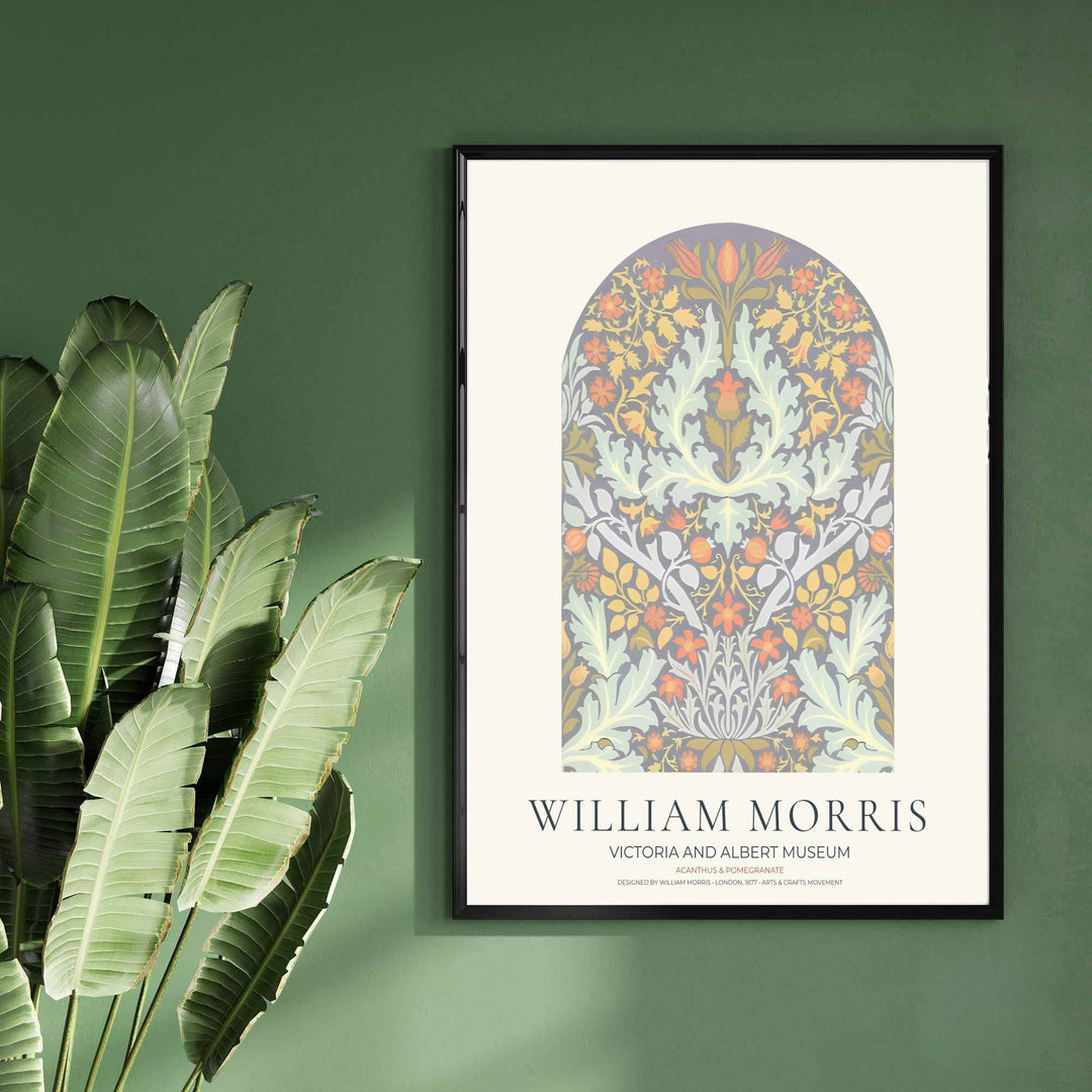 Decorative wall art print of the William Morris Acanthus and Pomegranate poster set against a soft cream background, bringing timeless vintage British botanical elegance into cozy home interiors.