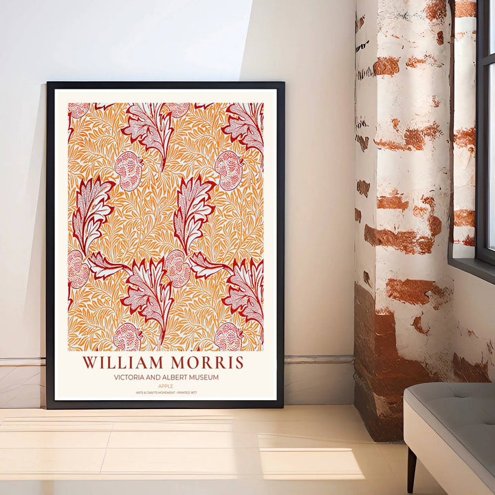 Decorative wall art print of William Morris Apple terracotta poster set against a clean cream margin, bringing timeless vintage British botanical elegance into home interior spaces.