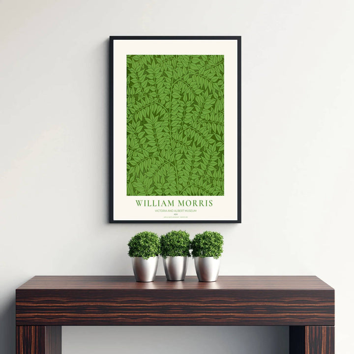 Classic William Morris Ash green print, adding a charming vintage flair and rich botanical detail to warm living room arrangements, entryways, and traditional interior spaces.