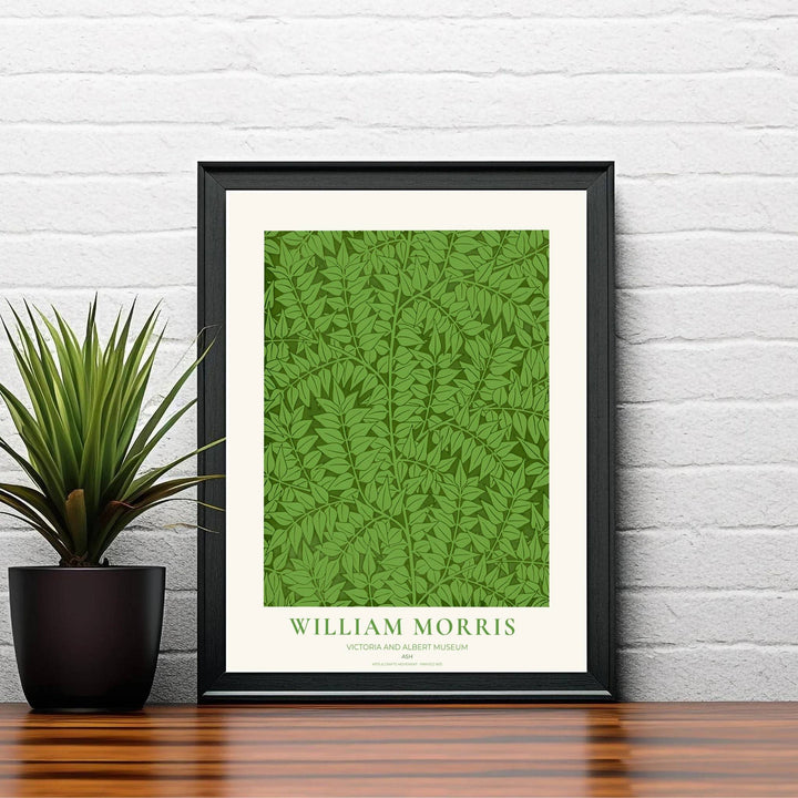 Historic artwork print of William Morris Ash, capturing stylized leaf silhouettes, rich forest shading, and dense green foliage backgrounds suited for bedroom, hallway, and office wall spaces.