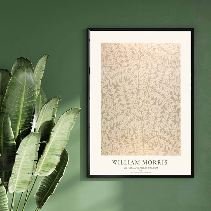 Classic William Morris Ash sage green print, adding a charming vintage flair and rich botanical detail to warm living room arrangements, entryways, and traditional interior spaces.