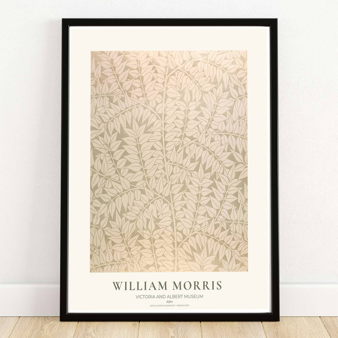 High quality William Morris Ash sage green cream leaf print displaying delicate foliage patterns and soft neutral tones perfect for subtle living room wall decor.
