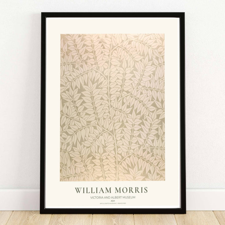 High quality William Morris Ash sage green cream leaf print displaying delicate foliage patterns and soft neutral tones perfect for subtle living room wall decor.