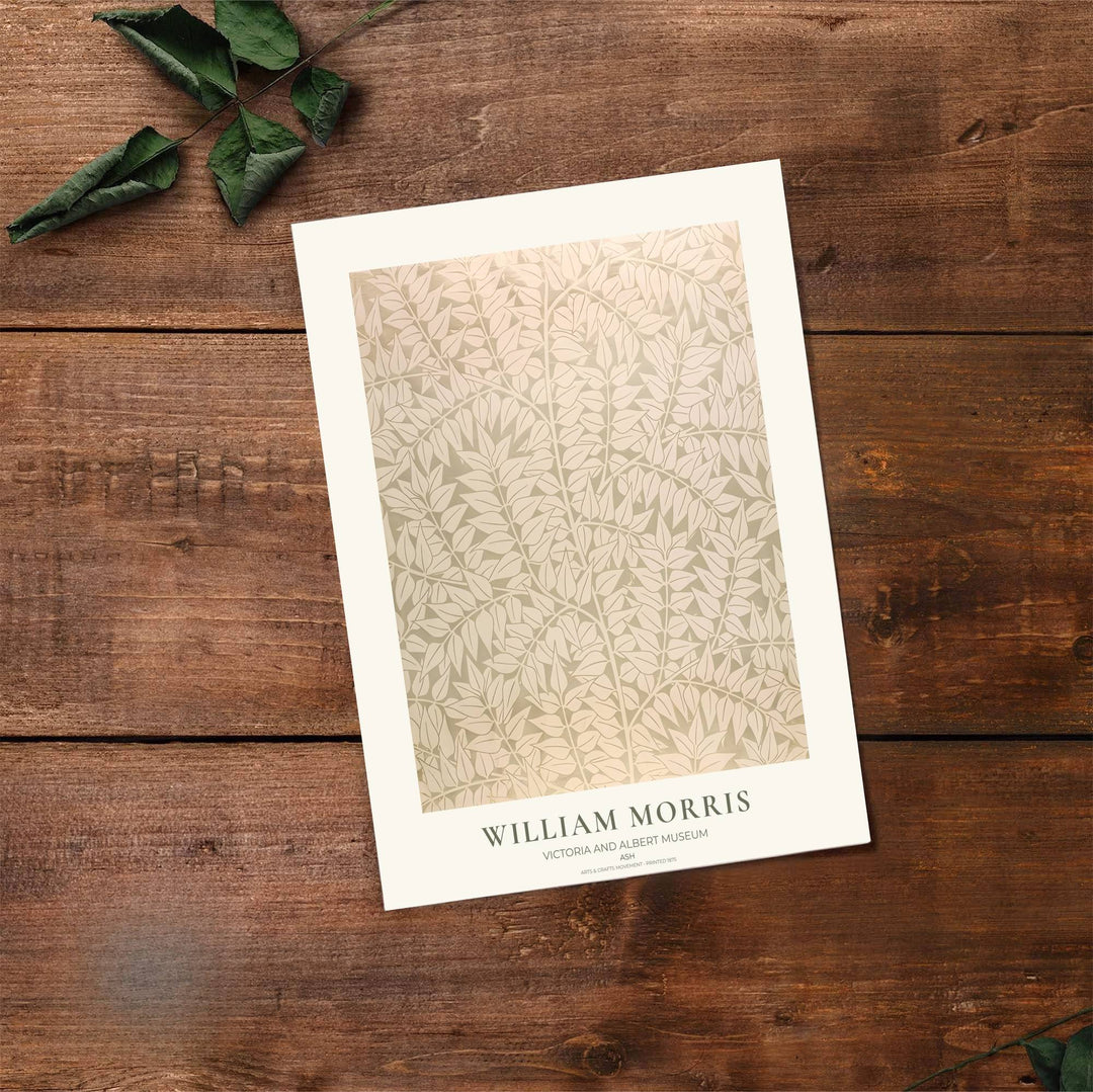 High definition graphic print of the renowned Ash design by William Morris, showcasing delicate foliage details and neutral sage green tones for lasting aesthetic appeal in residential spaces.