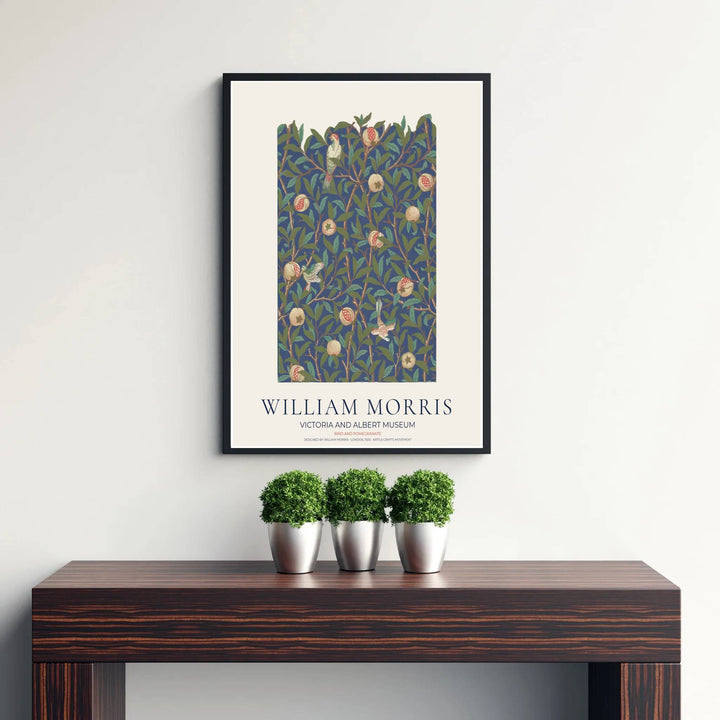 Fine art print showcasing the intricate bird and fruit detailing of William Morris Bird and Pomegranate, offering a rich aesthetic with deep blue background and natural branches for living room decor.