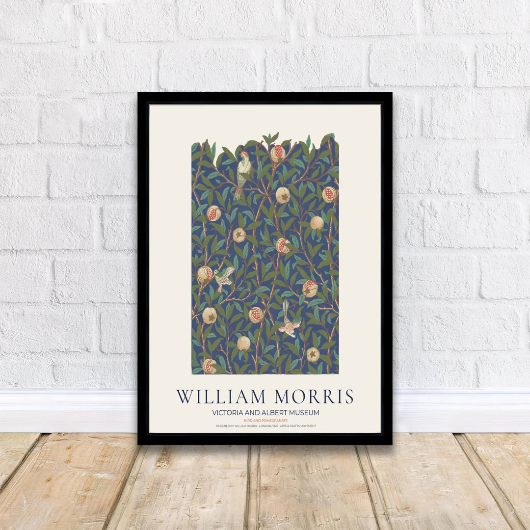 Modern decorative floral print of William Morris Bird and Pomegranate featuring detailed birds and dense dark blue leaf patterns, ideal for contemporary wall decoration and dramatic living areas.
