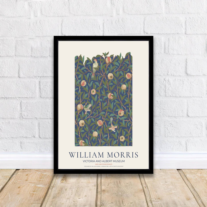Modern decorative floral print of William Morris Bird and Pomegranate featuring detailed birds and dense dark blue leaf patterns, ideal for contemporary wall decoration and dramatic living areas.