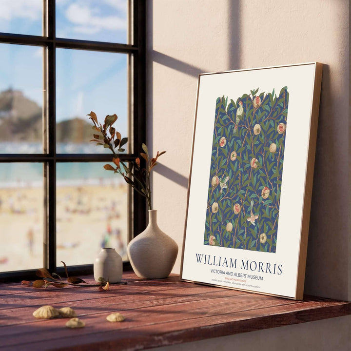 Timeless William Morris Bird and Pomegranate botanical art print, combining fluid vintage movement with historic exhibition typography elements to suit versatile living room and dining room interior decorating themes.