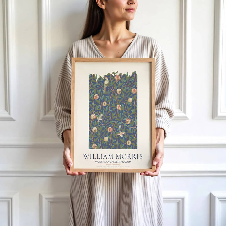 Archival visual print featuring William Morris Bird and Pomegranate foliage patterns, offering clean museum text borders and delicate bird figures suitable for home library, hallway, or study accent walls.