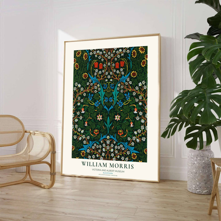 Elegant William Morris floral print capturing an 1892 vintage exhibition design with dark forest green background and blackthorn motifs to enhance traditional or modern home interior design.
