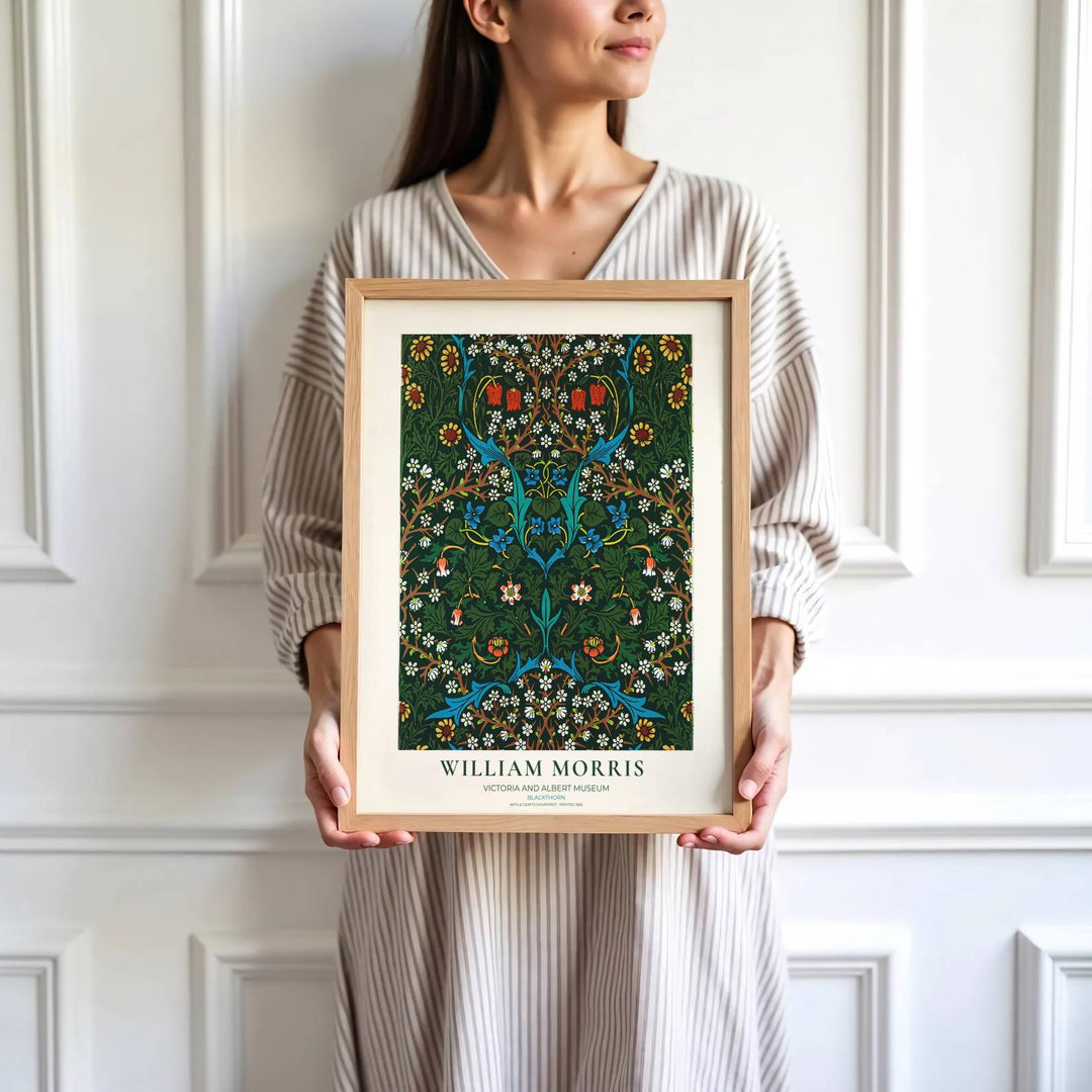 Authentic Arts and Crafts Blackthorn design print by William Morris, bringing organic energy, refined English heritage art, and rich dark green contrast into cozy home living spaces.