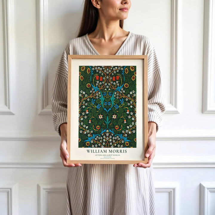 Authentic Arts and Crafts Blackthorn design print by William Morris, bringing organic energy, refined English heritage art, and rich dark green contrast into cozy home living spaces.