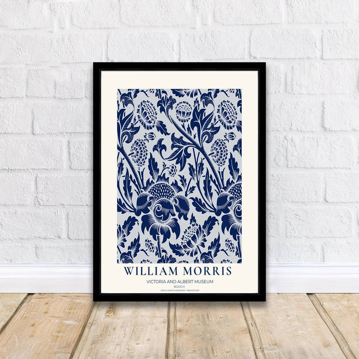 Classic William Morris Bough navy blue and white print, adding a charming vintage flair and rich botanical detail to warm living room arrangements, entryways, and traditional interior spaces.