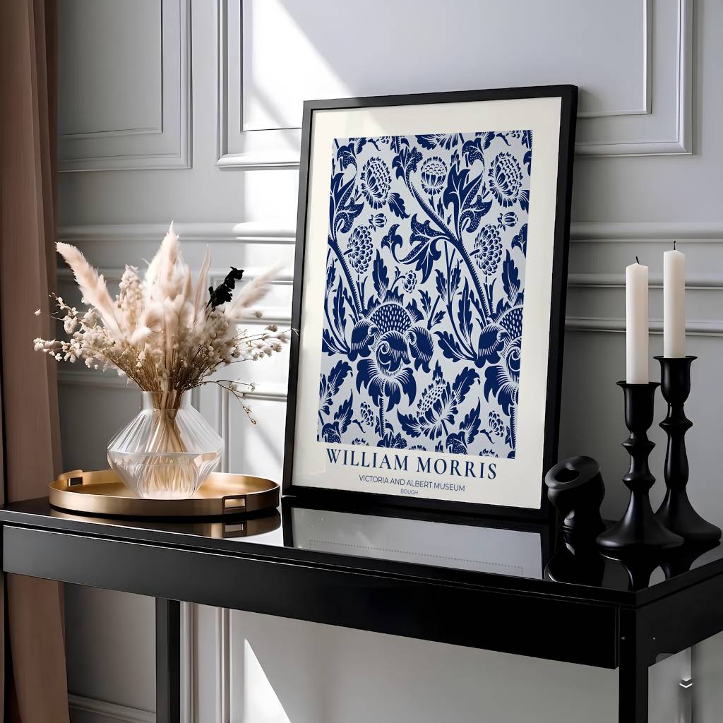 Elegant William Morris floral print capturing an 1877 vintage exhibition design with deep navy blue boughs on a white background to enhance traditional or modern home interior design.