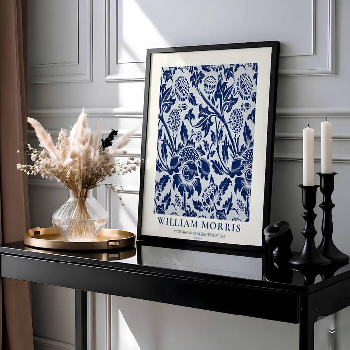 Elegant William Morris floral print capturing an 1877 vintage exhibition design with deep navy blue boughs on a white background to enhance traditional or modern home interior design.