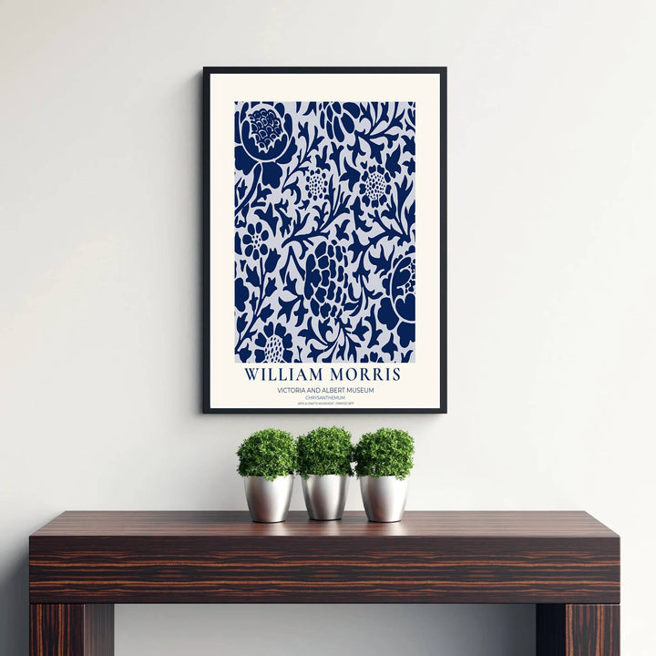 Fine art print showcasing the intricate flower and leaf detailing of William Morris Chrysanthemum, offering a crisp porcelain-like aesthetic with navy blue floral shapes for living room decor.
