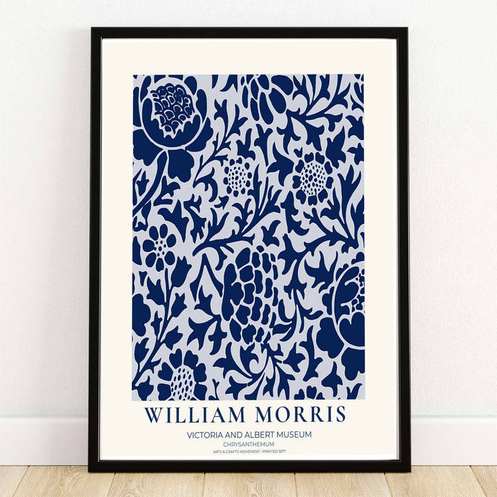 High quality William Morris Chrysanthemum navy blue white print displaying bold blooming floral shapes and detailed foliage perfect for crisp living room wall decor.