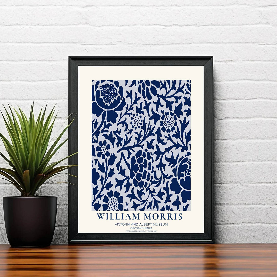 Classic William Morris Chrysanthemum navy blue and white print, adding a charming vintage flair and rich botanical detail to warm living room arrangements, entryways, and traditional interior spaces.