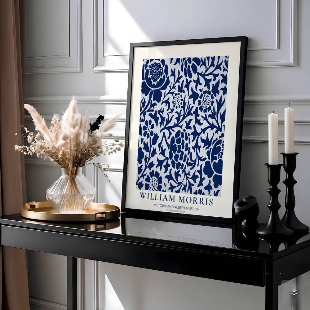Elegant William Morris floral print capturing an 1877 vintage exhibition design with deep navy blue chrysanthemums on a white background to enhance traditional or modern home interior design.